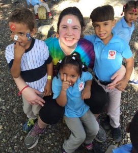 uring recess, students in the pre-K classes show off their stickers for a photo with their new friend Jeanne Lassere.