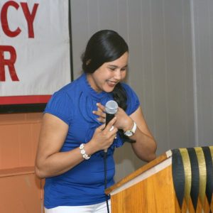 Virginia Mercado, a graduate of Aquinas Literacy Center, speaks from the heart after being awarded the Sister Claudia Hinds Scholarship.