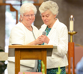 Sister Patricia Siemen, OP, new Prioress of the Adrian Dominican Congregation, with Sister Attract Kelly, OP, former Prioress, during the Celebration of Leadership Liturgy.