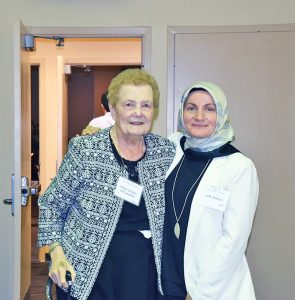 Sister Jeanne O’Laughlin, OP, left, with Asli Akkaya, faculty member of the Florida International University.