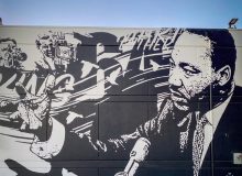 Mural graffiti in black and white showing Martin Luther King in Eugene, Oregon, USA